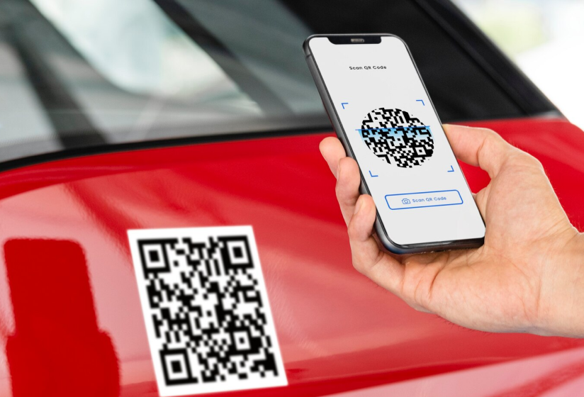 a hand holding a phone with qr code on it